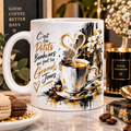 Mug blanc, illustration peinte noir et or : tasse de café dont la vapeur forme un cœur, vase de fleurs blanches et citation « les petits bonheurs font les grands jours »